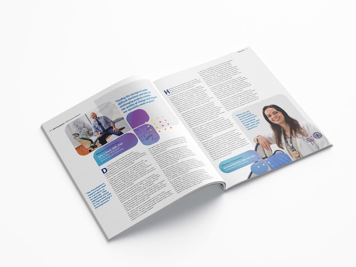 an open copy of the annual report showcasing pages with a lot of informative copy