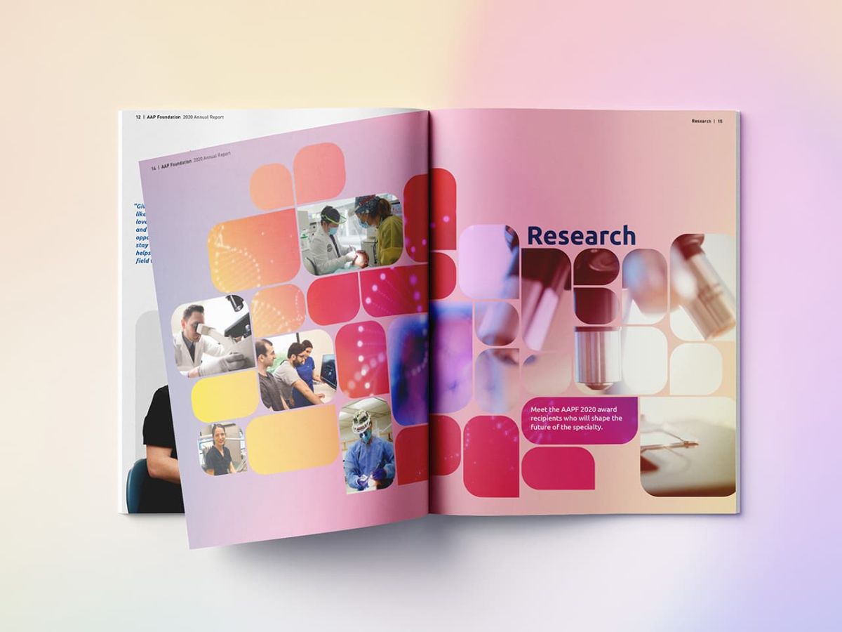 an open copy of the annual report featuring a colorful design with different shades of yellows and pinks